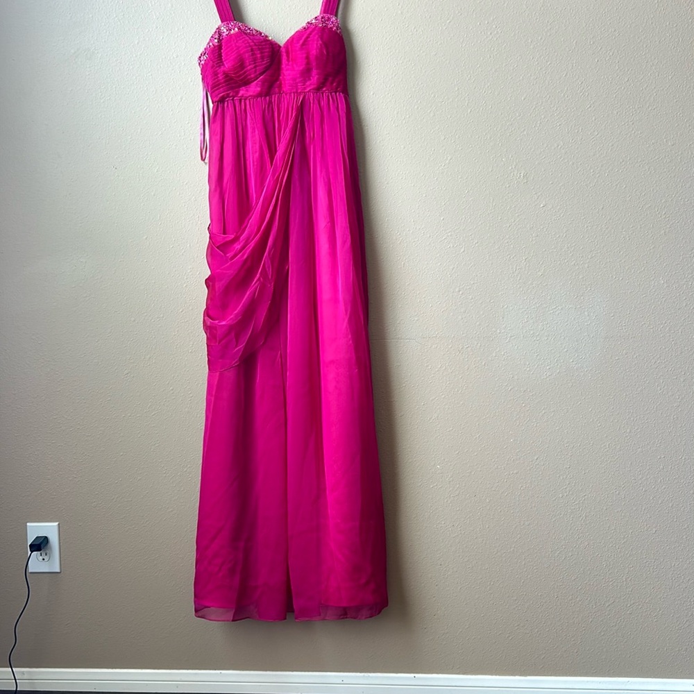 Beautiful fuchsia long dress made by aftershock of London.